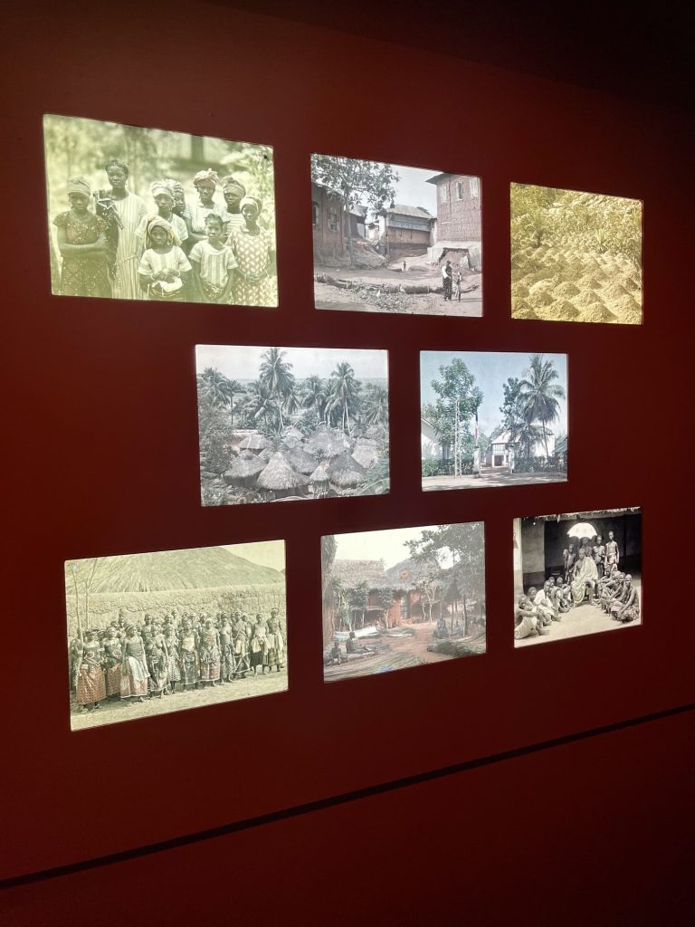 Installation view of the "Bénin Aller-Retour" exhibition at Musée Albert-Kahn, showing traditional Beninese culture and contemporary African art displayed together.